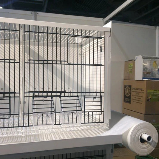 Dronpaper-white paper coil + 49- 57 Cm plastic. Width and 100 ML. -Hygiene cleaning cages