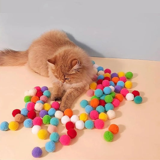 Emocionante e interactivo lanzador de juguetes de alta energía para gatos: atractiva ayuda de entrenamiento con 100 bolas de pompones para estimular el ejercicio del gato.