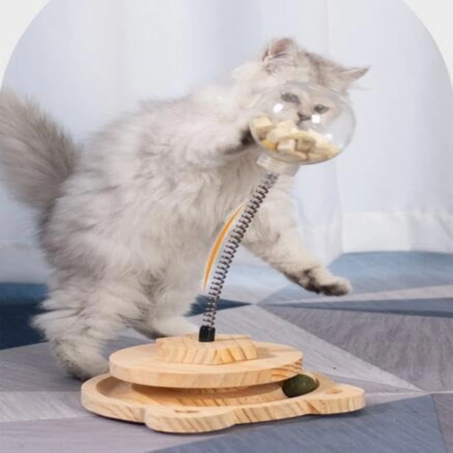 Juguete interactivo y atractivo para gatos con forma de bola con golosinas que gotea: divertido y estimulante, con pista de resorte de madera para mascotas, ideal para el desarrollo mental.