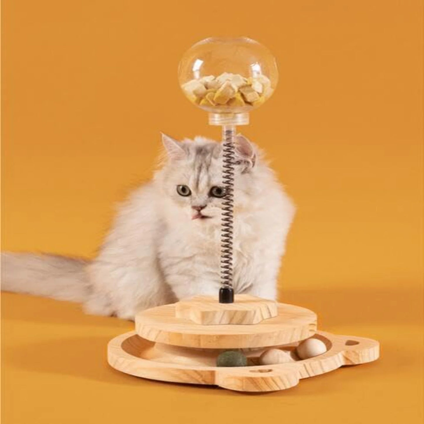 Juguete interactivo y atractivo para gatos con forma de bola con golosinas que gotea: divertido y estimulante, con pista de resorte de madera para mascotas, ideal para el desarrollo mental.