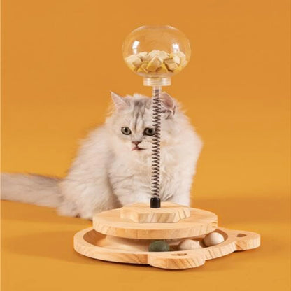 Juguete interactivo y atractivo para gatos con forma de bola con golosinas que gotea: divertido y estimulante, con pista de resorte de madera para mascotas, ideal para el desarrollo mental.